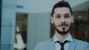 Portrait of a confident business professional in a modern office setting.